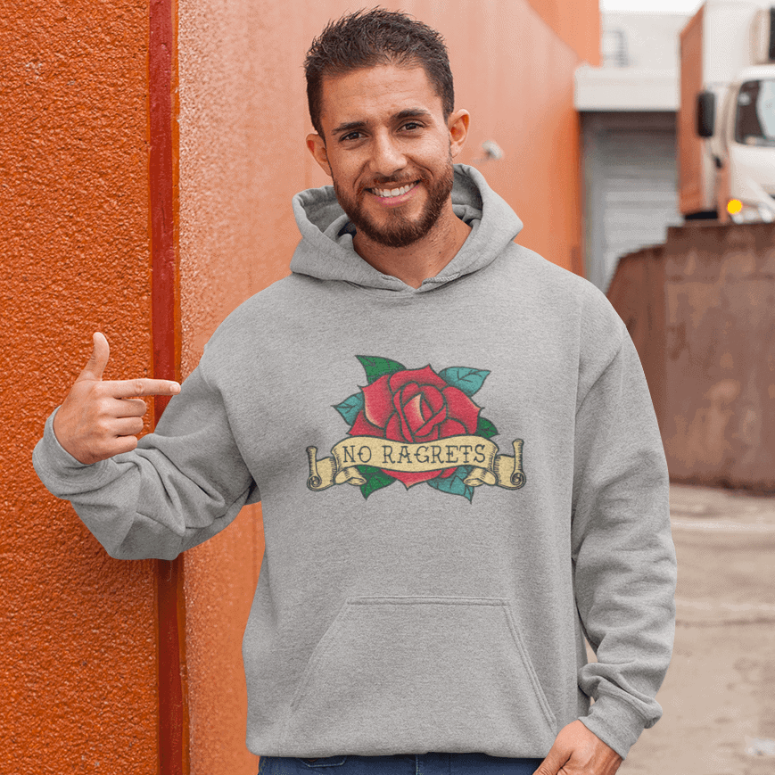 Man wearing light grey hoodie sweatshirt with funny image of an old school rose flash tattoo with the words 'No ragrets' intentionally misspelled.