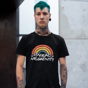 Man wearing a black t-shirt with a graphic of a rainbow and the words 'Spread negativity' printed on the front.