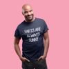 Smiling man wearing a navy blue t-shirt with the text 'Farts are always funny' printed on the front.