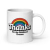 White ceramic mug with a rainbow and the text "Thanks for the childhood trauma' printed on both sides.