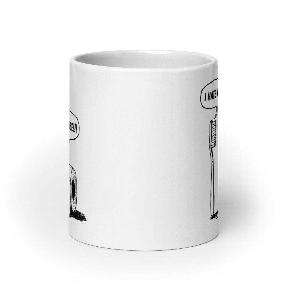 White ceramic mug with a cartoon graphic on both sides. The cartoon is a line drawing of a toothbrush and roll of toilet paper. Both have speech bubbles above . The toothbrush says 'I hate my job' and the toilet paper says 'Oh please.'