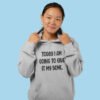 Woman wearing light grey hoodie sweatshirt with the text 'Today I am going to give it my some.' printed on the front.