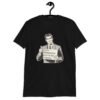Black t-shirt with graphic of a retro man holding sign that says 'Ladies, mansplaining is short for man explaining' printed on the front.