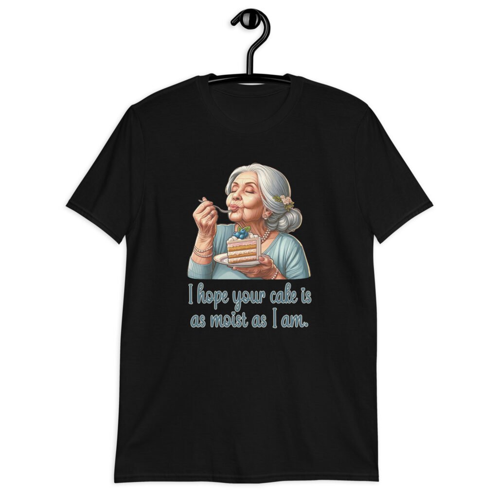 Black t-shirt with an image of grey haired older woman enjoying a bite of a piece of cake with the words 'I hope your cake is as moist as I am' printed on the front.