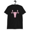 Black t-shirt with image of a pink uterus flipping middle finger graphic printed on the front.