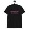 Black t-shirt with the text 'The boobs are real, the smile is fake.' printed in pink on the front.