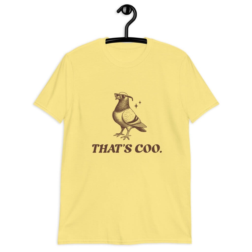 Cornsilk yellow t-shirt with an image of a pigeon and the words 'That's coo.' printed on the front.