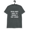 Dark heather grey t-shirt with the text 'Voted most likely to become a cult leader' printed on the front.