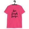Heliconia pink t-shirt with the parody phrase 'Live, Laugh, Lucifer' printed on the front.
