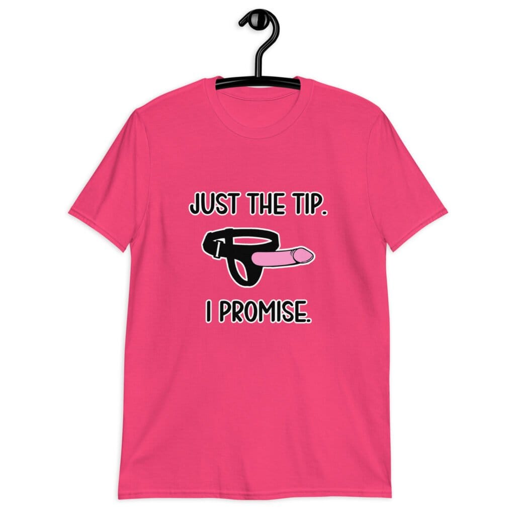 Heliconia pink t-shirt that has an image of a strap-on dildo and the words 'Just the tip. I promise.' printed on the front.