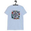 Light blue t-shirt with a multi color floral wreath design printed on the front. The words 'One mental breakdown later...' are printed in the center of the wreath.