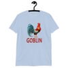 Light blue t-shirt with an image of a rooster and the word 'Goblin' printed under the rooster. The graphics are printed on the front of the shirt.