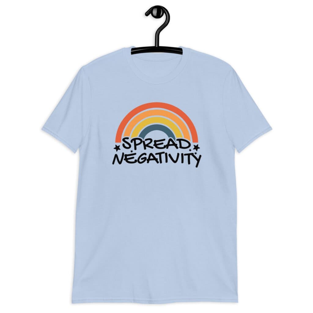 Light blue t-shirt with a graphic of a rainbow and the words 'Spread negativity' printed on the front.
