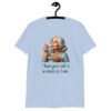 Light blue t-shirt with an image of grey haired older woman enjoying a bite of a piece of cake with the words 'I hope your cake is as moist as I am' printed on the front.