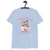 Light blue t-shirt that says 'I think about murder' with image of cute fluffy kitten sitting in a teacup printed on the front.