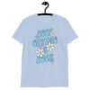 Light blue t-shirt with a retro daisy and star design and the text 'Stop giving a fuck' printed on the front.