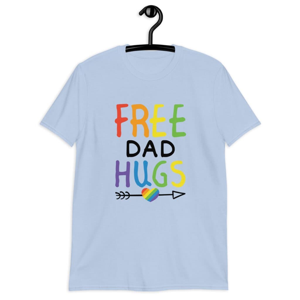 Light blue t-shirt with the text 'Free Dad hugs' printed on the front in rainbow letters.