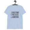 Light blue t-shirt that has an image of a surgical scalpel and the phrase 'Vasectomy prevents abortion' printed on the front.