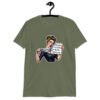 Military green t-shirt that has a graphic of an angry looking retro woman holding a knife and a sign. The sign says 'Tell me to calm down. I dare you.' The graphic is printed on the front of the shirt.