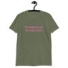 Military green t-shirt with the text 'The boobs are real, the smile is fake.' printed in pink on the front.