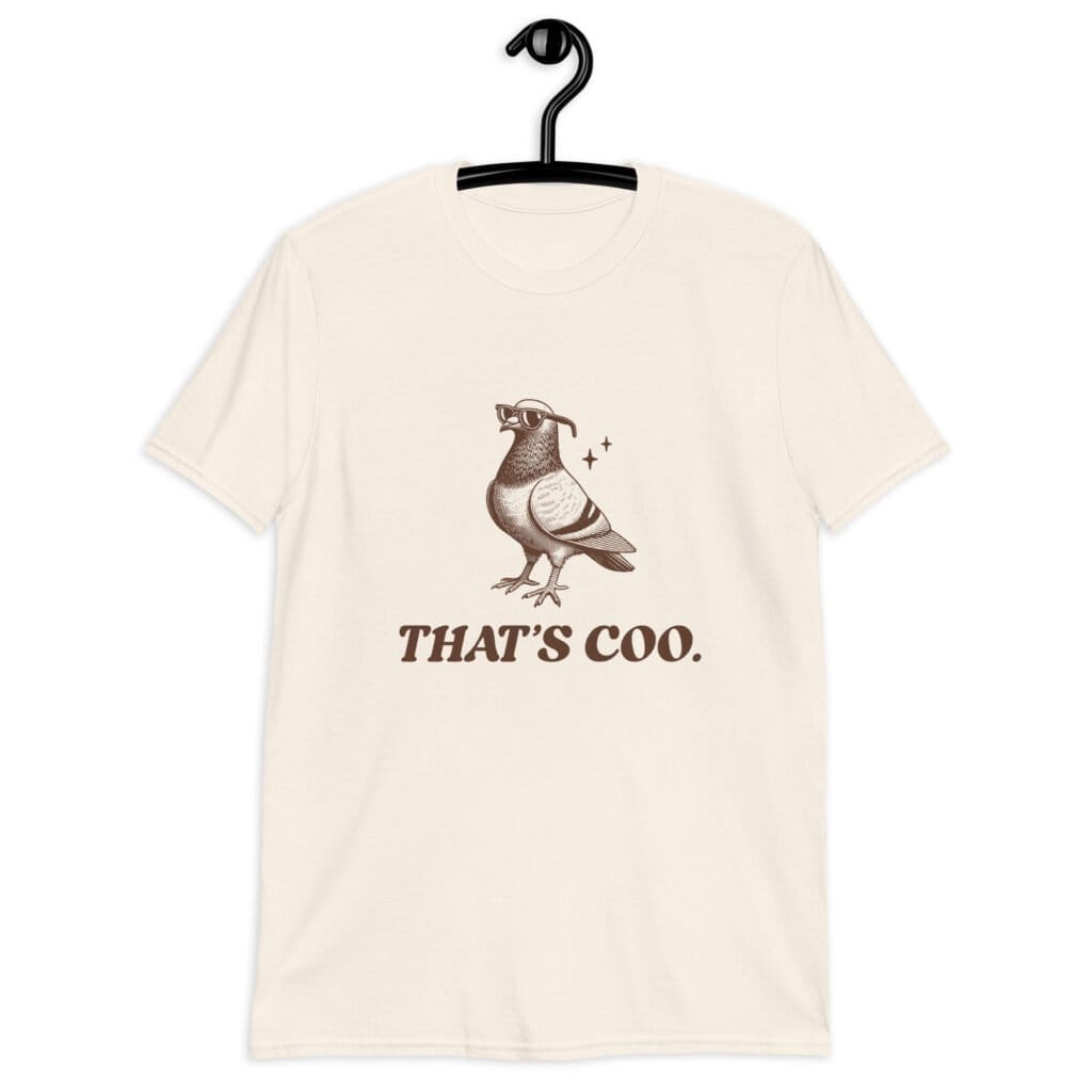 Natural color t-shirt with an image of a pigeon and the words 'That's coo.' printed on the front.