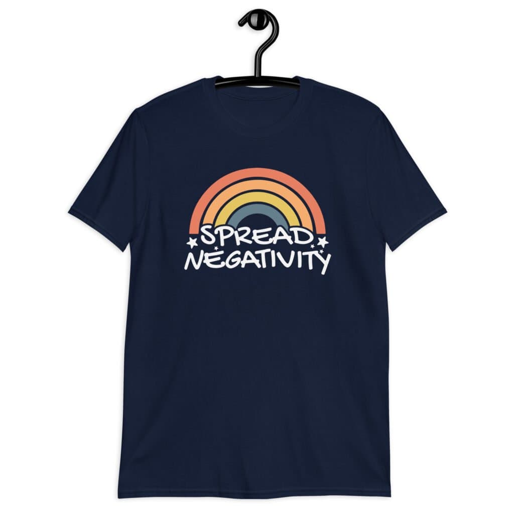 Navy blue t-shirt with a graphic of a rainbow and the words 'Spread negativity' printed on the front.