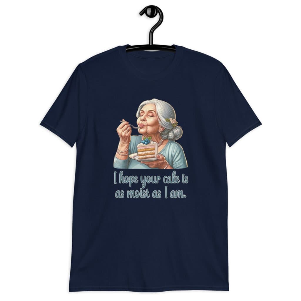 Navy blue t-shirt with an image of grey haired older woman enjoying a bite of a piece of cake with the words 'I hope your cake is as moist as I am' printed on the front.