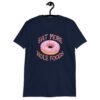 Navy blue t-shirt that has an image of a donut with pink icing and sprinkles and the text 'Eat more hole foods' printed on the front.