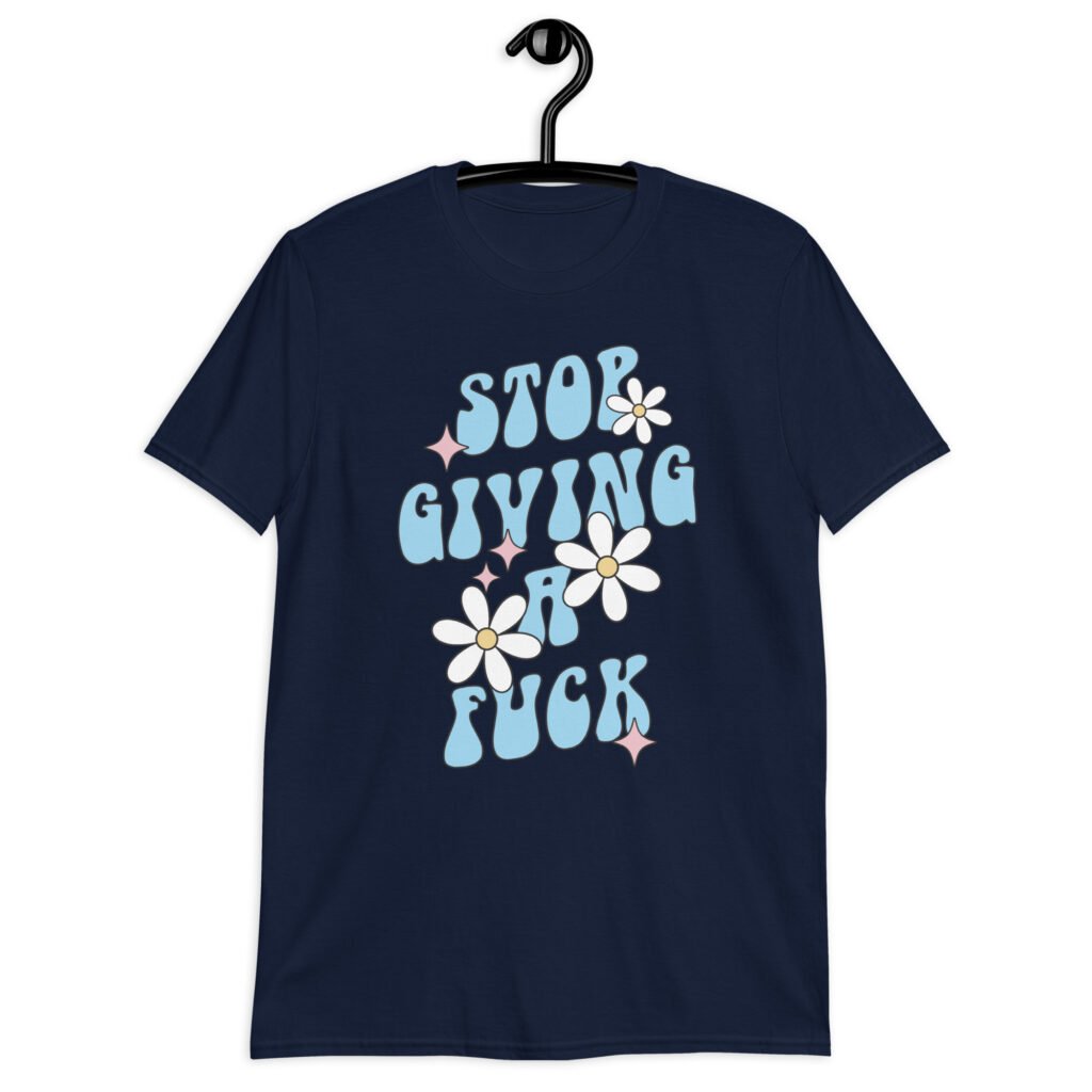 Navy blue t-shirt with a retro daisy and star design and the text 'Stop giving a fuck' printed on the front.