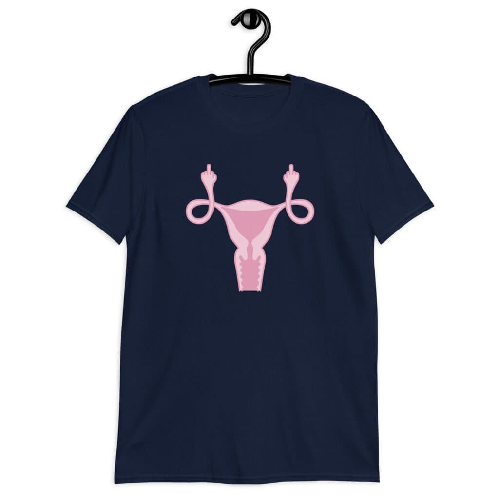 Navy blue t-shirt with image of a pink uterus flipping middle finger graphic printed on the front.
