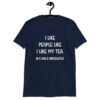 Navy blue t-shirt with the text 'I like people like I like my tea. In a bag & underwater.' printed on the front.