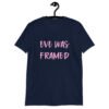 Navy blue t-shirt with the text 'Eve was framed' printed on the front in pink.