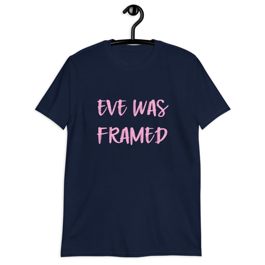 Navy blue t-shirt with the text 'Eve was framed' printed on the front in pink.