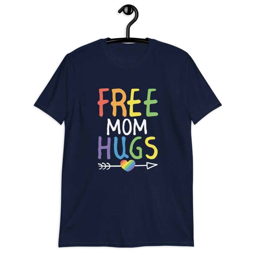 Navy blue t-shirt with the text 'Free Mom hugs' in rainbow lettering printed on the front.