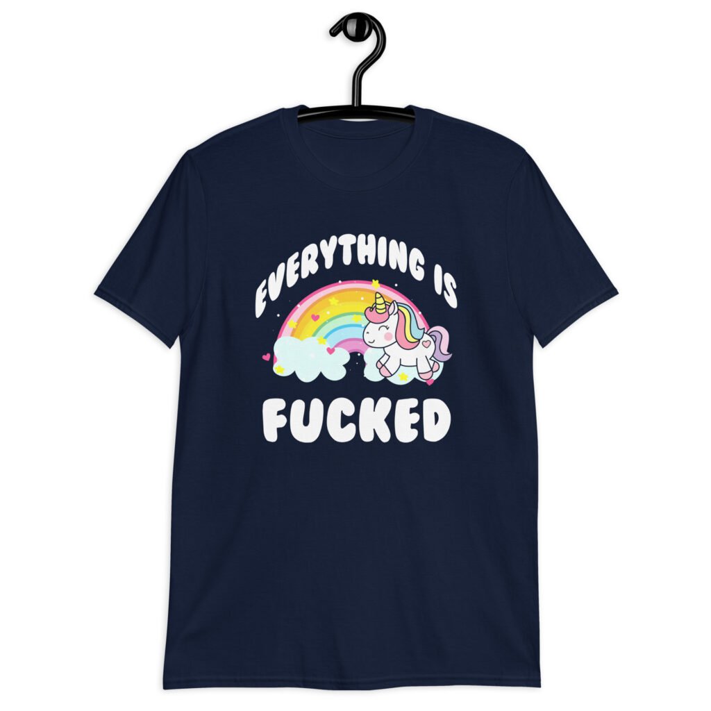 Navy blue t-shirt with a graphic of a kawaii style unicorn and a pastel rainbow with the text 'Everything is fucked' printed on the front.