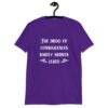 Purple t-shirt with the text 'The dildo of consequences rarely arrives lubed' printed on the front.