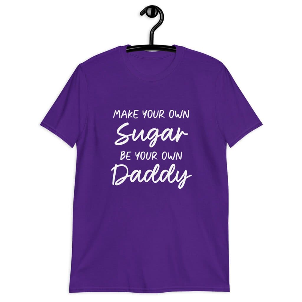 Purple t-shirt with the text 'Make your own sugar Be your own Daddy' printed on the front.