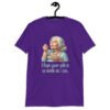 Purple t-shirt with an image of grey haired older woman enjoying a bite of a piece of cake with the words 'I hope your cake is as moist as I am' printed on the front.
