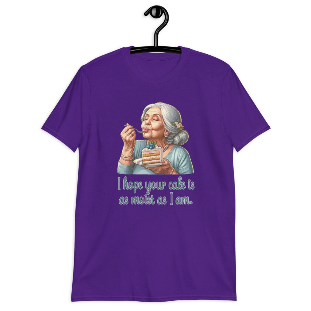Purple t-shirt with an image of grey haired older woman enjoying a bite of a piece of cake with the words 'I hope your cake is as moist as I am' printed on the front.