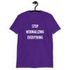 Purple t-shirt with the text 'Stop normalizing everything' printed on the front.