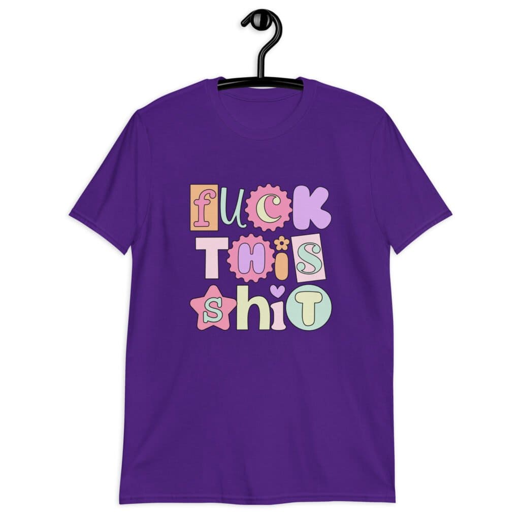 Purple t-shirt with colorful pastel font 'Fuck this shit' graphics printed on the front.