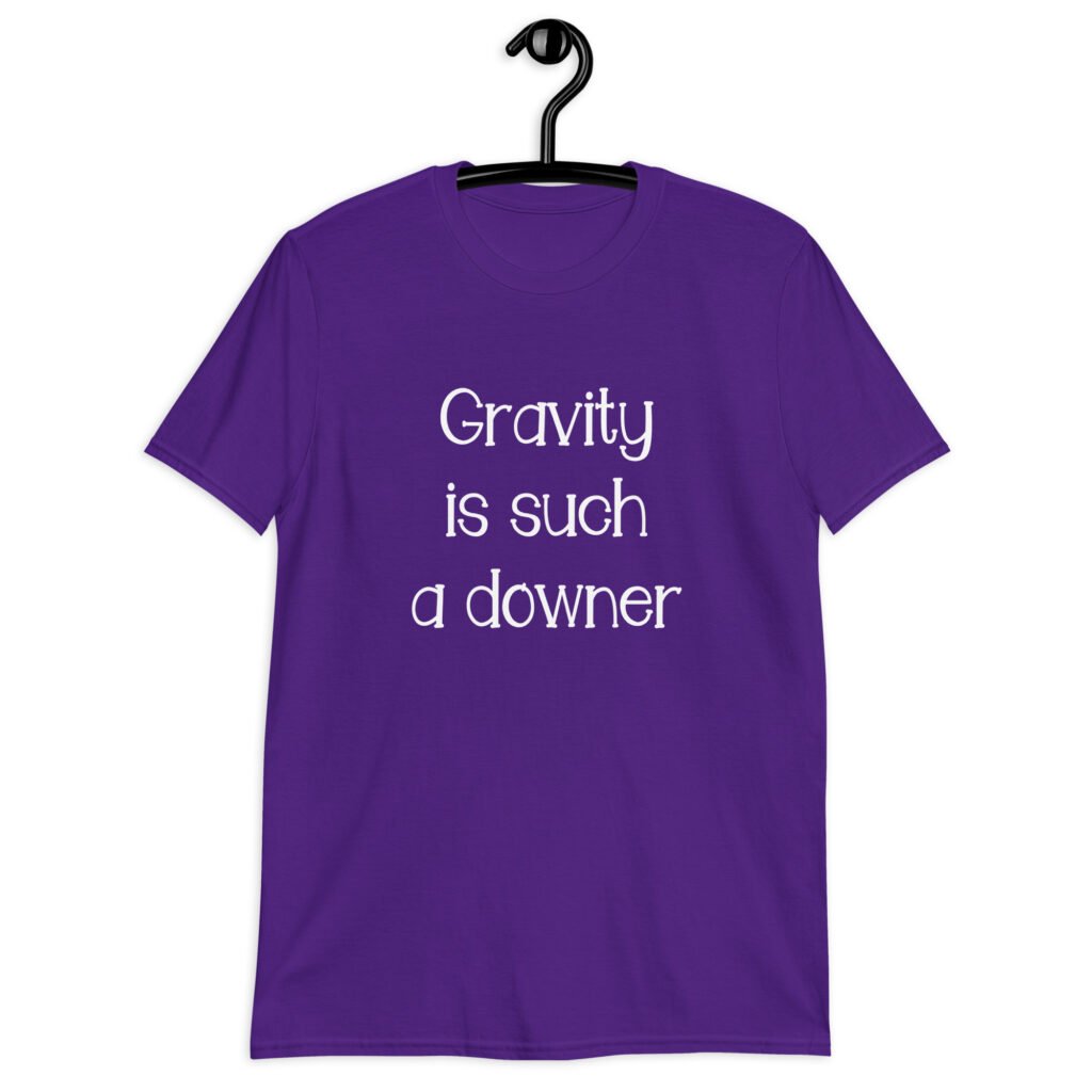 Purple t-shirt with the text 'Gravity is such a downer' printed on the front.