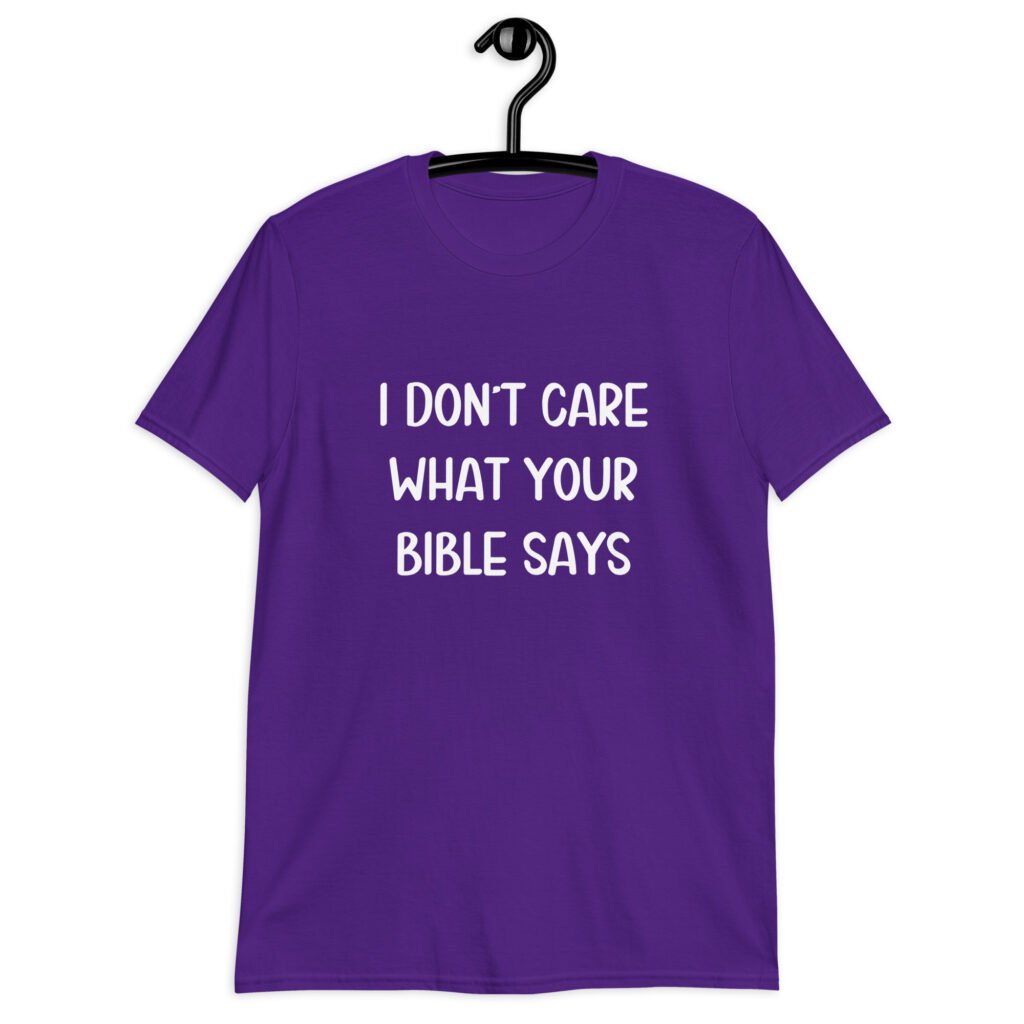 Purple t-shirt with the text 'I don't care what your bible says' printed on the front.
