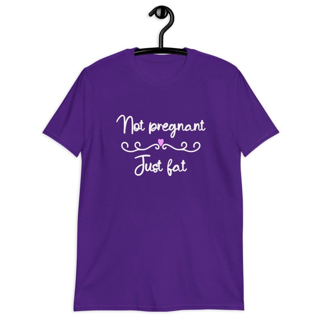 Purple t-shirt with the words 'Not pregnant just fat' printed on the front with a heart.