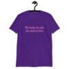 Purple t-shirt with the text 'The boobs are real, the smile is fake.' printed in pink on the front.