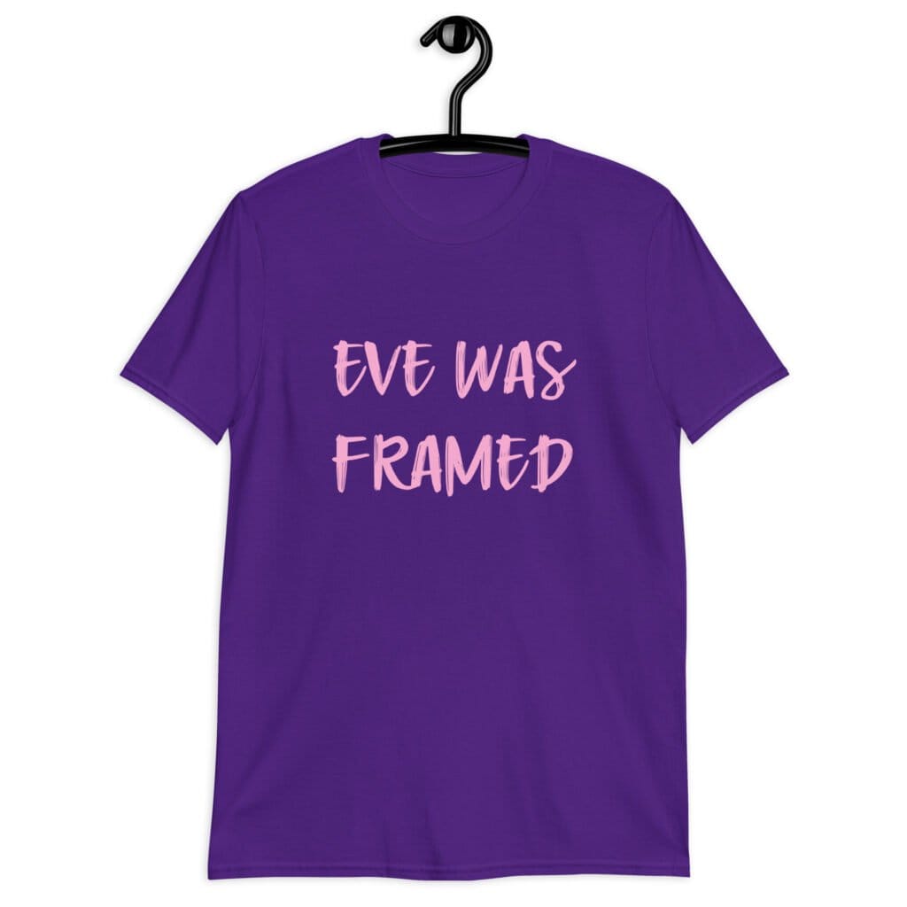 Purple t-shirt with the text 'Eve was framed' printed on the front in pink.
