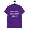 Purple t-shirt with the text 'Normal people scare the crap out of me' printed on the front.
