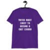 Purple t-shirt with the text 'Voted most likely to become a cult leader' printed on the front.