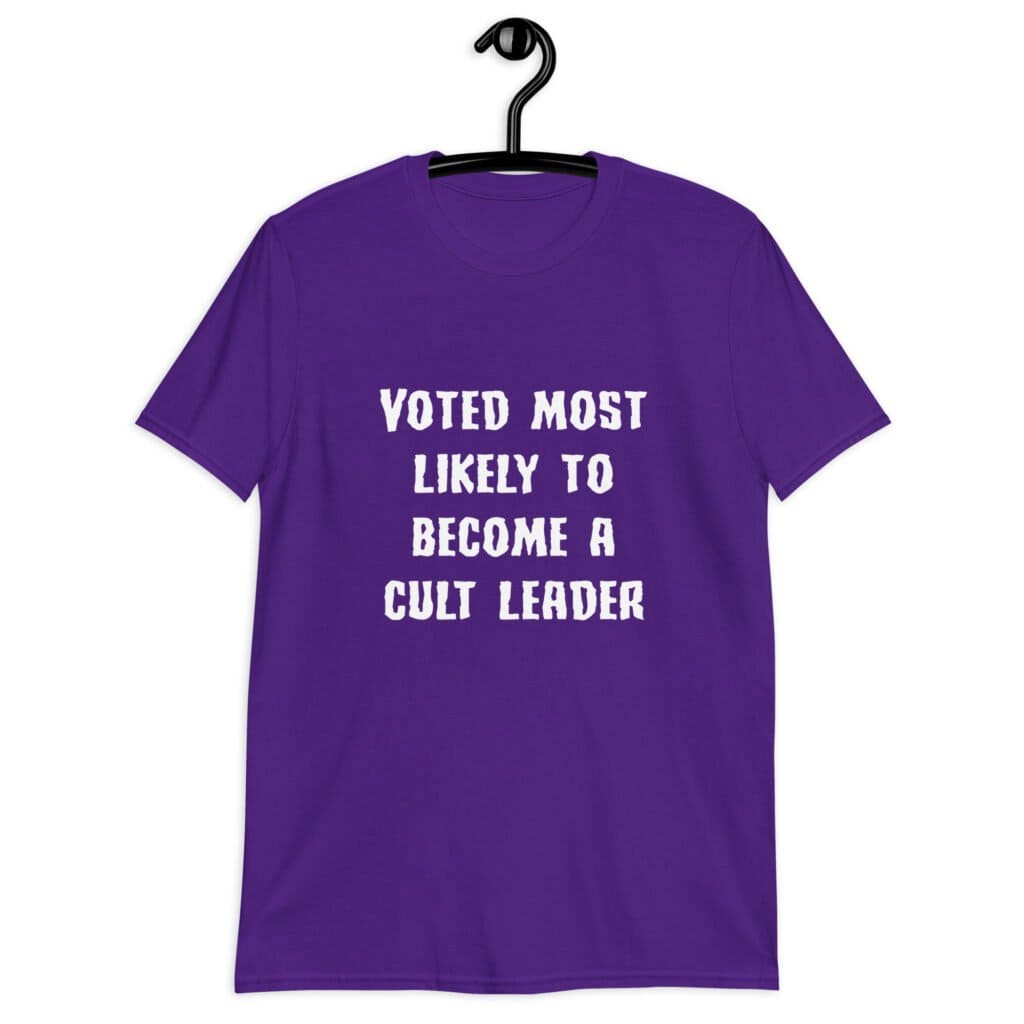 Purple t-shirt with the text 'Voted most likely to become a cult leader' printed on the front.