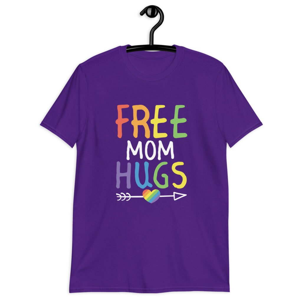 Purple t-shirt with the text 'Free Mom hugs' in rainbow lettering printed on the front.